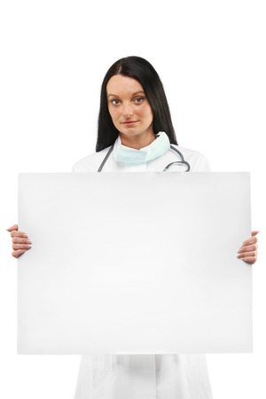 Female doctor holding an blank advertisement boardの写真素材