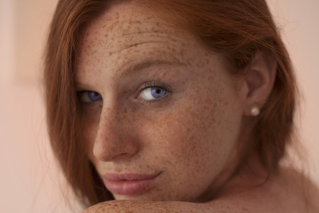 Beautiful freckled redhead womanの写真素材