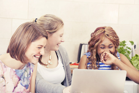 Happy friends spending time togetherの写真素材