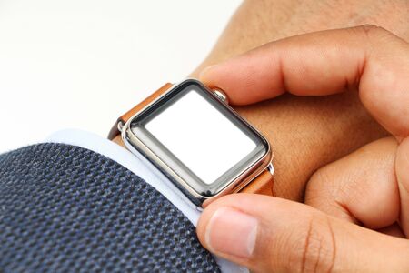 Business' mans hand with a smart watch and blank spaceの写真素材
