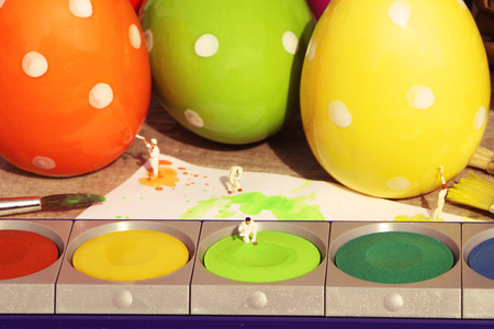 Easter eggs and miniatures backgroundの写真素材