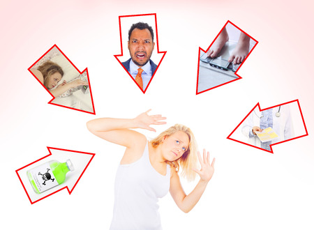 Woman pressured by multiple issuesの写真素材