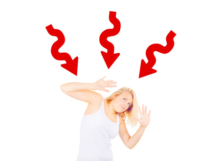 Woman pressured by multiple issuesの写真素材