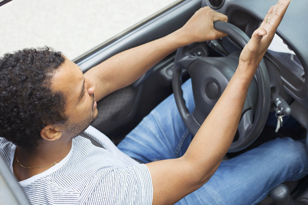 Man in car annoyed by trafficの写真素材