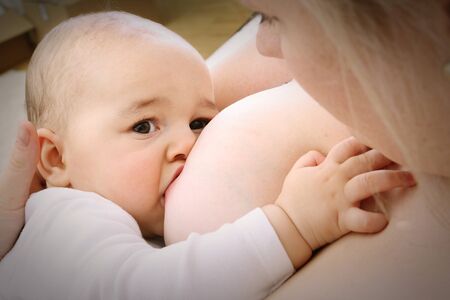 Mother breastfeeding her babyの写真素材