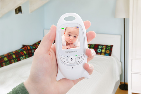 Mother can't go to bed early because of babyの写真素材