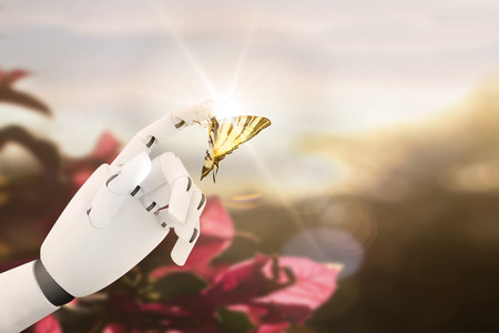Robot hand with a butterfly on it's fingerの写真素材