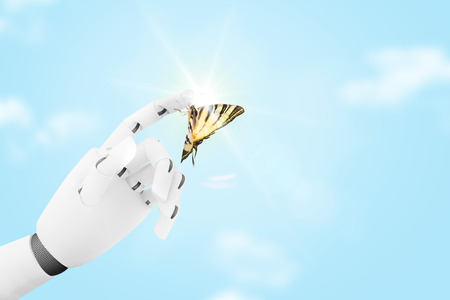 Robot hand with a butterfly on it's fingerの写真素材