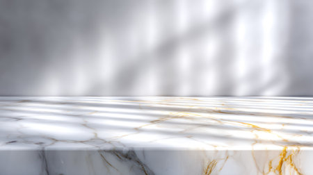 A luxurious, clean white marble surface with subtle gold veining, perfect as a sophisticated tabletop for product photography. This bright, elegant background is ideal for marketing, e-commerce, and presentations focused on beauty, luxury, or wellness products.の素材