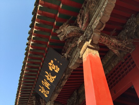 Close up view of a sign board at the entrance of an ancient architectural buildingのeditorial素材