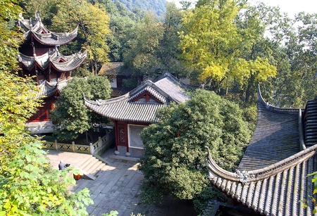 Tile roofs of mountain buddhist temple near Hangzhou in Chinaのeditorial素材