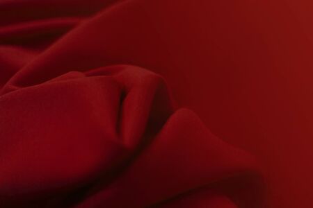 Red textile material close up