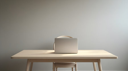 white laptop on a wooden tableの素材