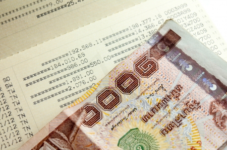 Statements and thai currencyの写真素材