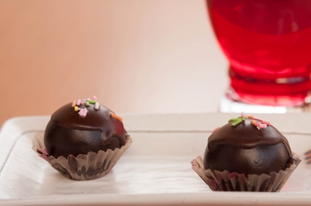 Chocolate Ball cake with softdrink or Juice の写真素材