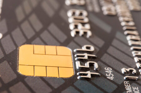 Macro shot with old credit card の写真素材