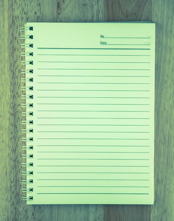 note pad on wooden backgroundの写真素材