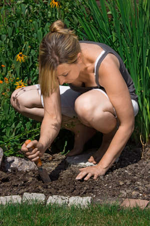Young female gardeningの写真素材