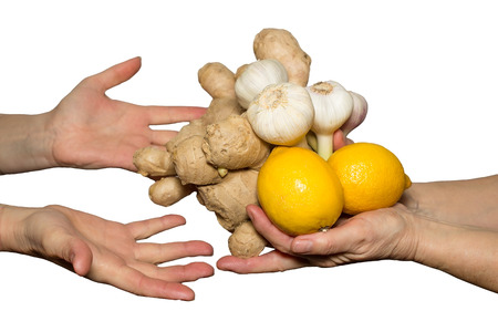 Handing some garlic,ginger and lemons
