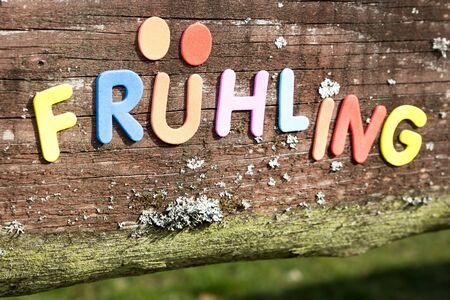 Close up of colorful letters written with Springの写真素材