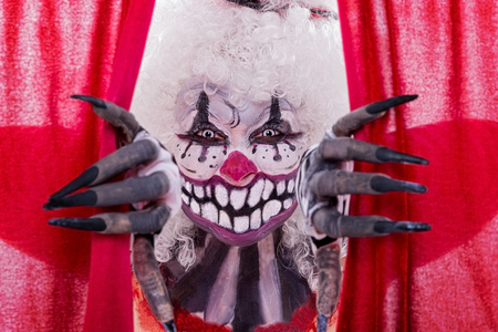 Sugar Skull pushes red curtains asideの写真素材