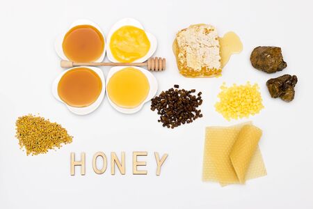 Compilation of different honey products on a white backgroundの写真素材