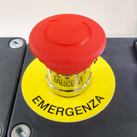 emergency button of an industrial machine (italian version)の写真素材