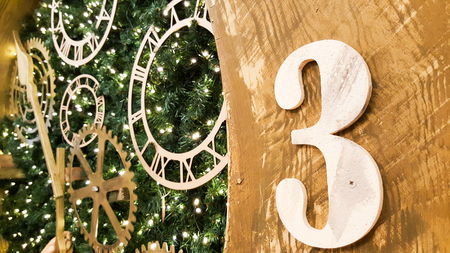 detail of a wooden Christmas clock