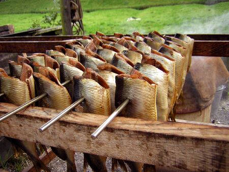    Smoked fish in array:close-up details.      
