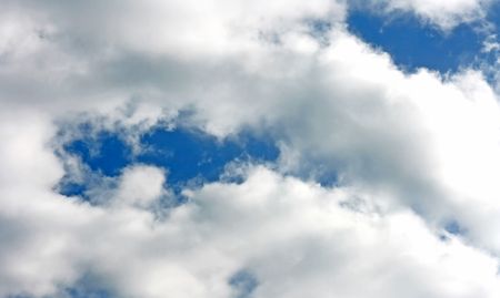 Cumulus clouds captured on a beautiful blue sky.の写真素材