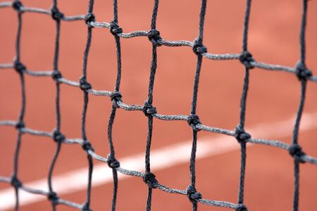 Close-up details of a tennis net-angle view (with selective focus).の写真素材