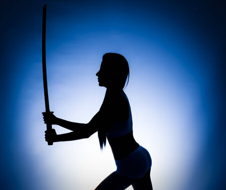 Beautiful girl with a swordの写真素材