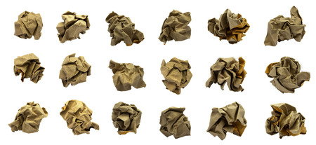 Brown crumpled paper ball set on a white background, isolated.の写真素材