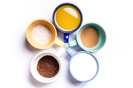 Cups of coffee, milk, juice, cappuccino. Isolated on a white background. Colorful cups. Glasses Placed in a circle. Energy background.の写真素材