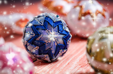 Christmas background, decoration. Christmas balls on a wooden table. Soft focus. Sparkles and bubbles. Abstract background. Vintageの写真素材