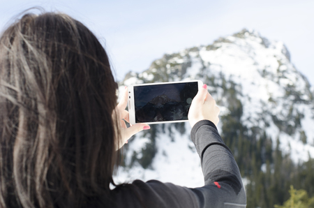woman is taking a photoの写真素材