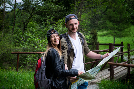 Young couple traveling in a nature. Happy people. Travel lifestyle