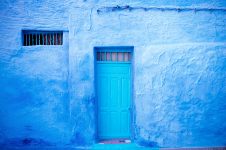 Chefchaouen - blue city of Morocco. Detail on a blue doors and walls. Blue town street.の写真素材