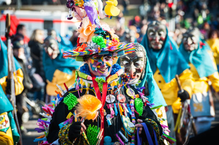 Herrenberg, Gemany - February 21, 2012: Local Carnival Parade with traditional wooden masks also known as Swabian-Alemannic carnival.のeditorial素材
