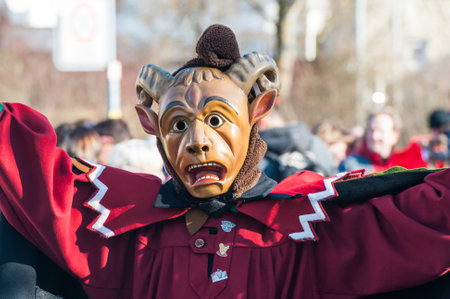 Herrenberg, Gemany - February 21, 2012: Local Carnival Parade with traditional wooden masks also known as Swabian-Alemannic carnival.のeditorial素材