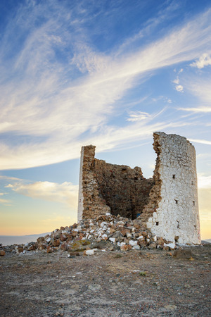 The ruin of an old windmill in Bodrum at sunsetの写真素材