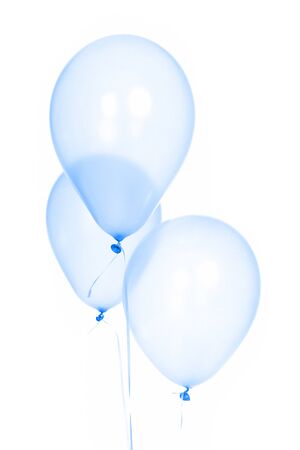 Three fun and cute blue balloons for children's party celebrationの写真素材