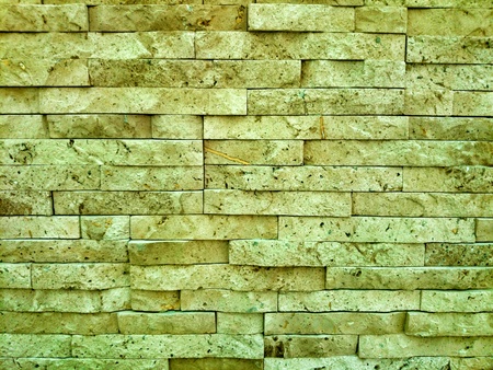 Natural stone wall. Light brown . の素材