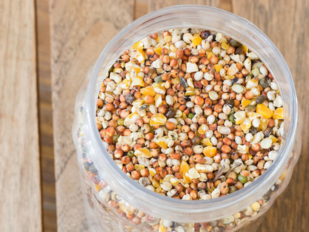 MIxed seed in jar Pet food for birds の写真素材