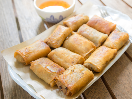 fried spring rolls in white plate