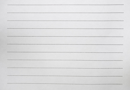 White paper with dot line, noted book paper background.の写真素材