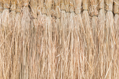 Bunches of brown rice straw background