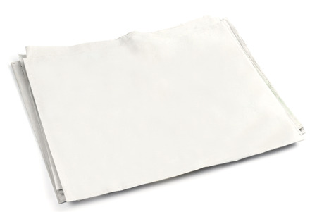 Blank newspaper front page with copyspace on white backgroundの写真素材