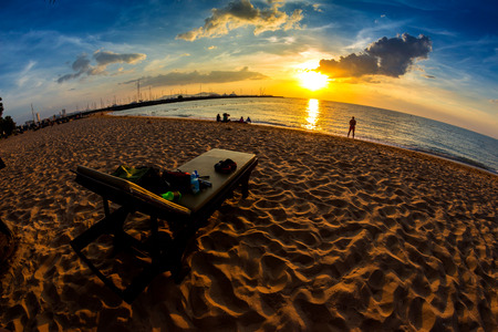 Tropical beach at sunset, Beach Chair on Pattaya Beach, Thailand, fisheye viewの写真素材