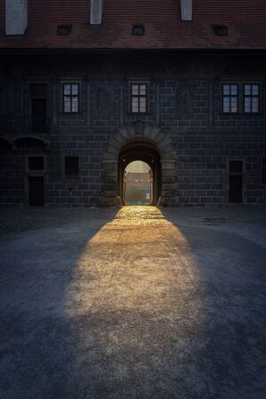 Sunlight from the through of gate loophole castle of Cesky Krumlov in Czech Republic.のeditorial素材